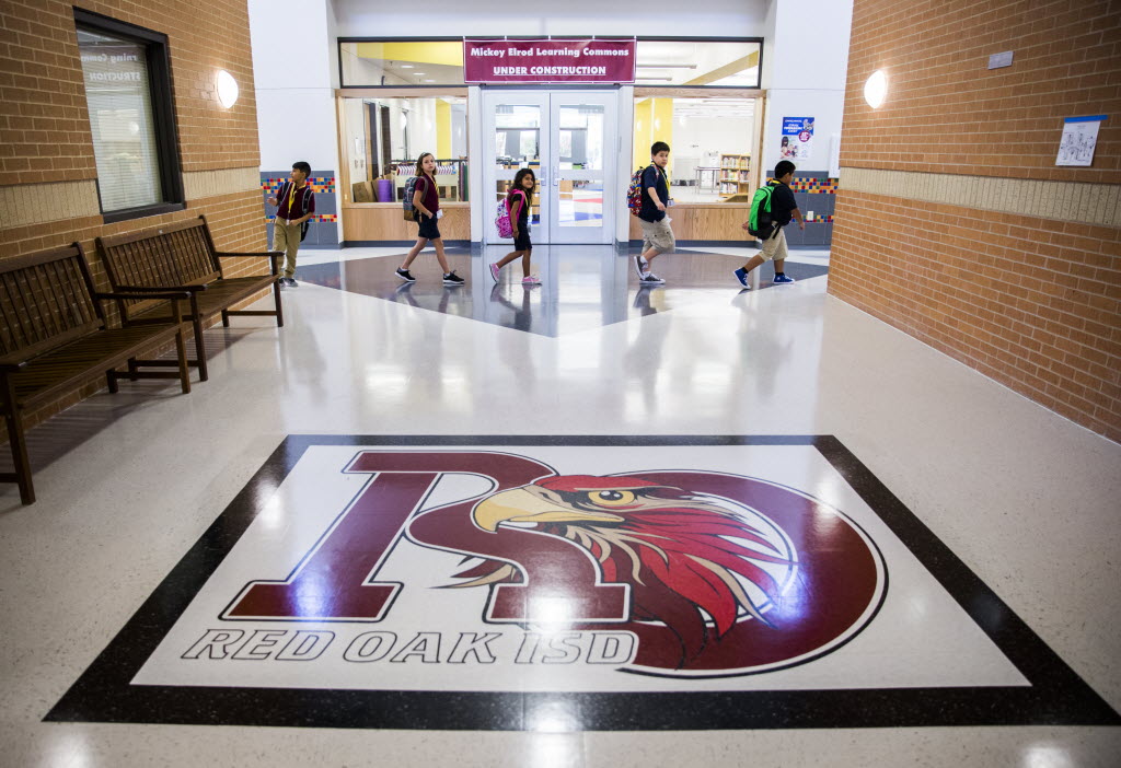 'We're back home' Red Oak ISD students return to rebuilt school after