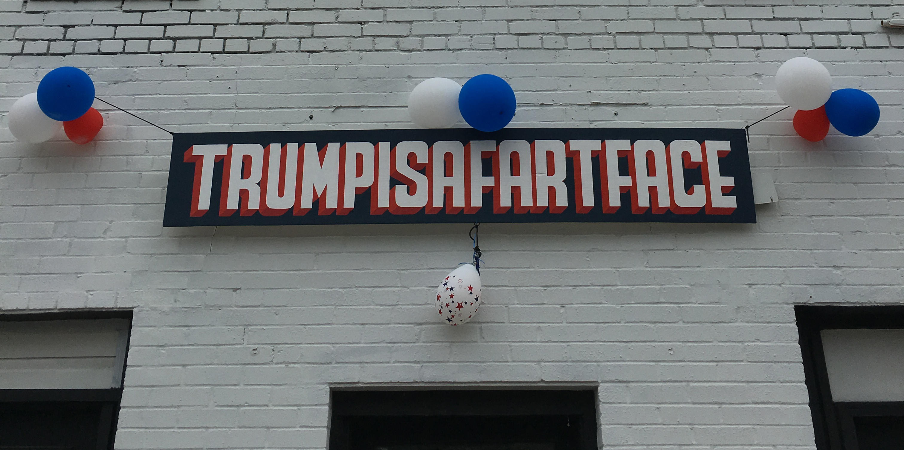 Texas artist shares 'Trump is a fart face' sign in Oak Cliff 2016