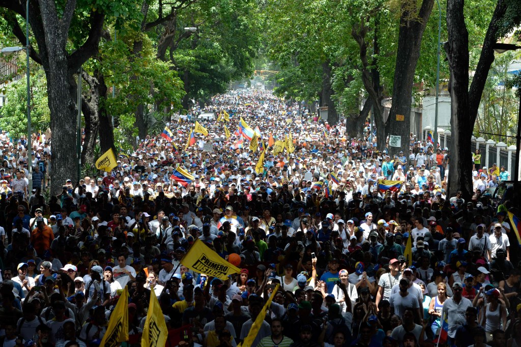 Thousands of demonstrators rallied Wednesday against Venezuelan President Nicolas Maduro in Caracas. 