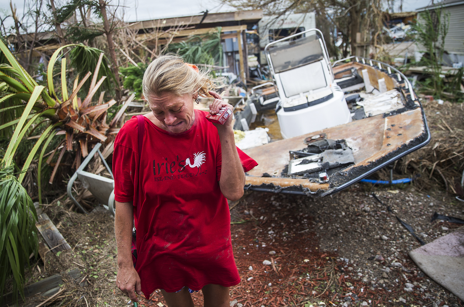 Melani Zurawski cries while inspecting her home Sunday in Port Aransas. &nbsp;(Nick Wagner/Austin American-Statesman)