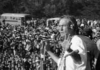Timothy Leary addresses a crowd of hippies at the "Human Be-In" that he helped organize in Golden Gate Park in San Francisco on Jan. 14, 1967.  (File Photo/The Associated Press)