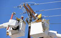 Dallas-based Oncor wants the state to expedite additional electric transmission projects.(Louis DeLuca/Staff Photographer)