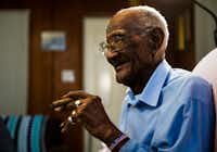 <p><span style="font-size: 1em; background-color: transparent;">U.S. Army veteran Richard Overton, shown just before his 112th birthday, smokes one of his many daily cigars at his Austin home.</span></p>(Ashley Landis/Staff Photographer)