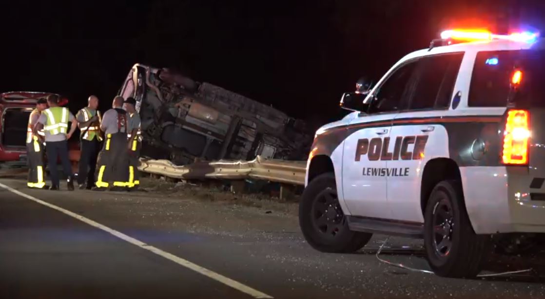 Driver rescued from SUV that rolled over guardrail on Highway 121 in