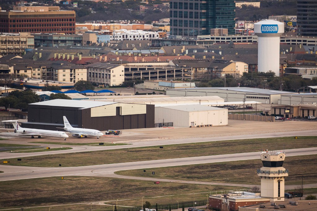 Crews battle blaze at Addison Airport after plane crashes into hangar