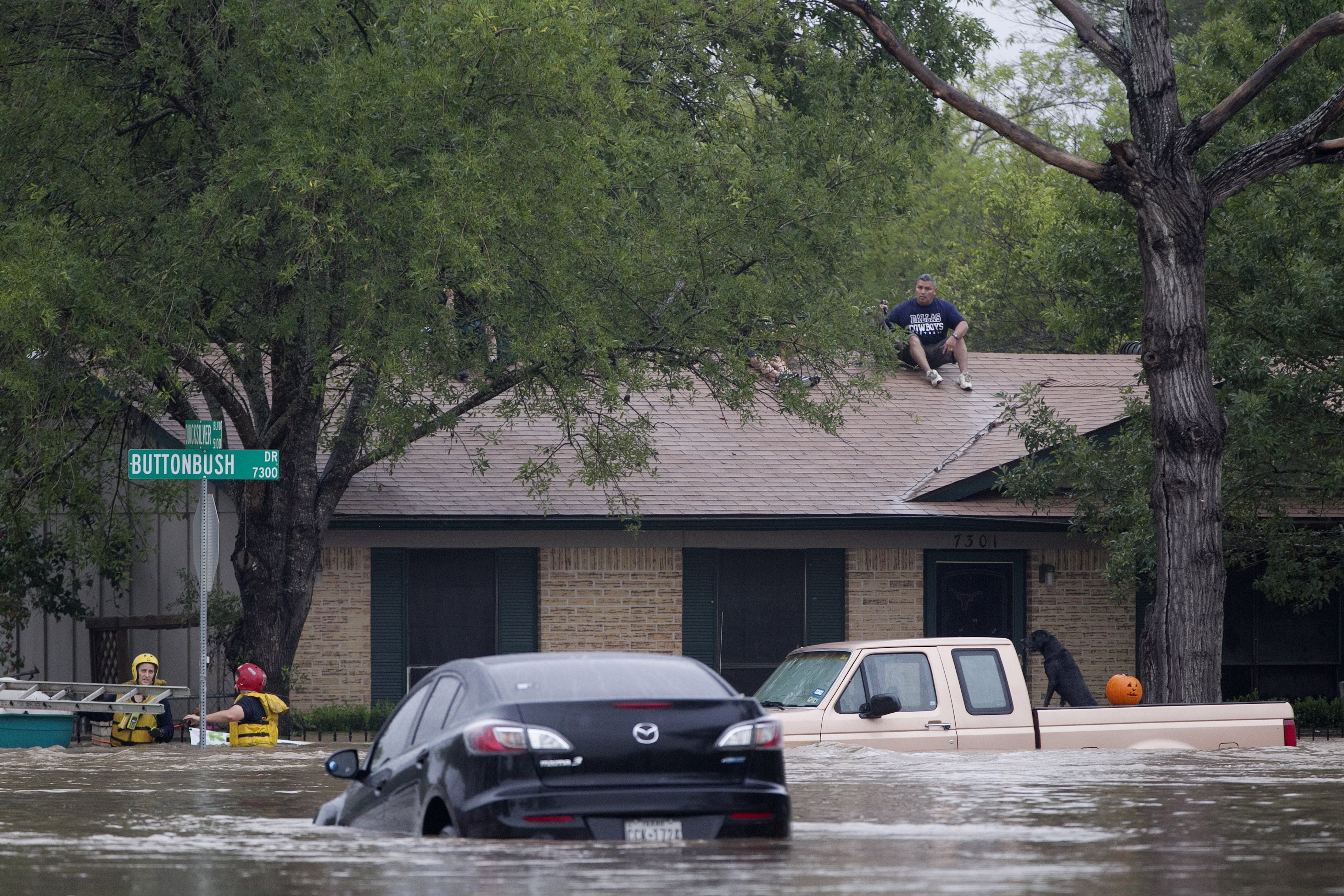 2 dead, dozens rescued as over a foot of rain floods Austin area