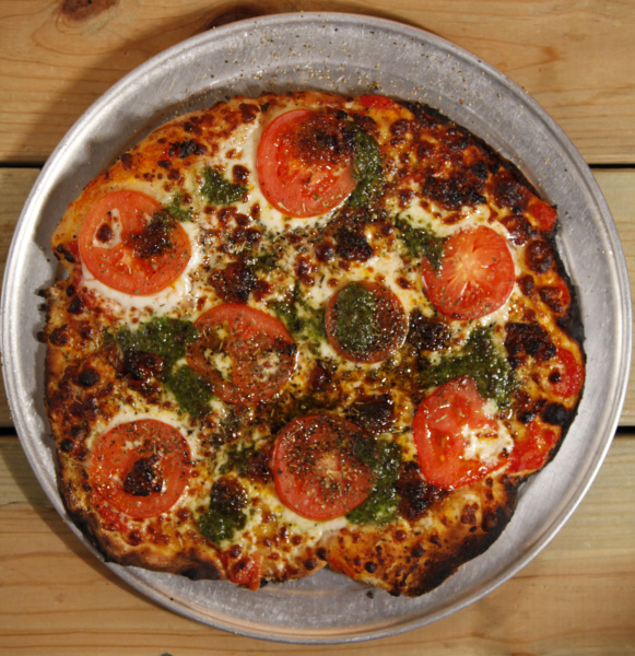 Enjoy woodfired pizza with Texas accents at Ancient Ovens Texas